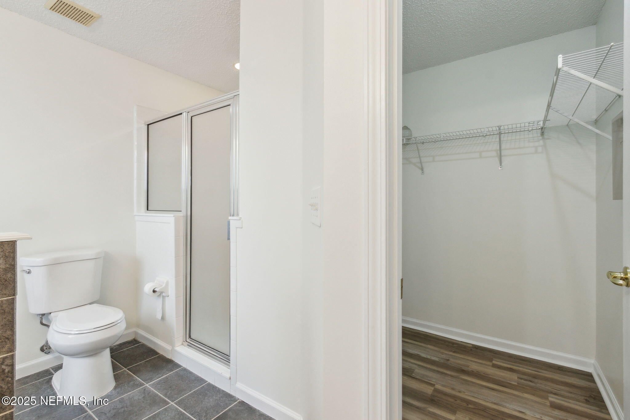 2005 Frogmore Drive Middleburg, FL 32068 - Photo 33 of 43 a bathroom with a toilet and a shower