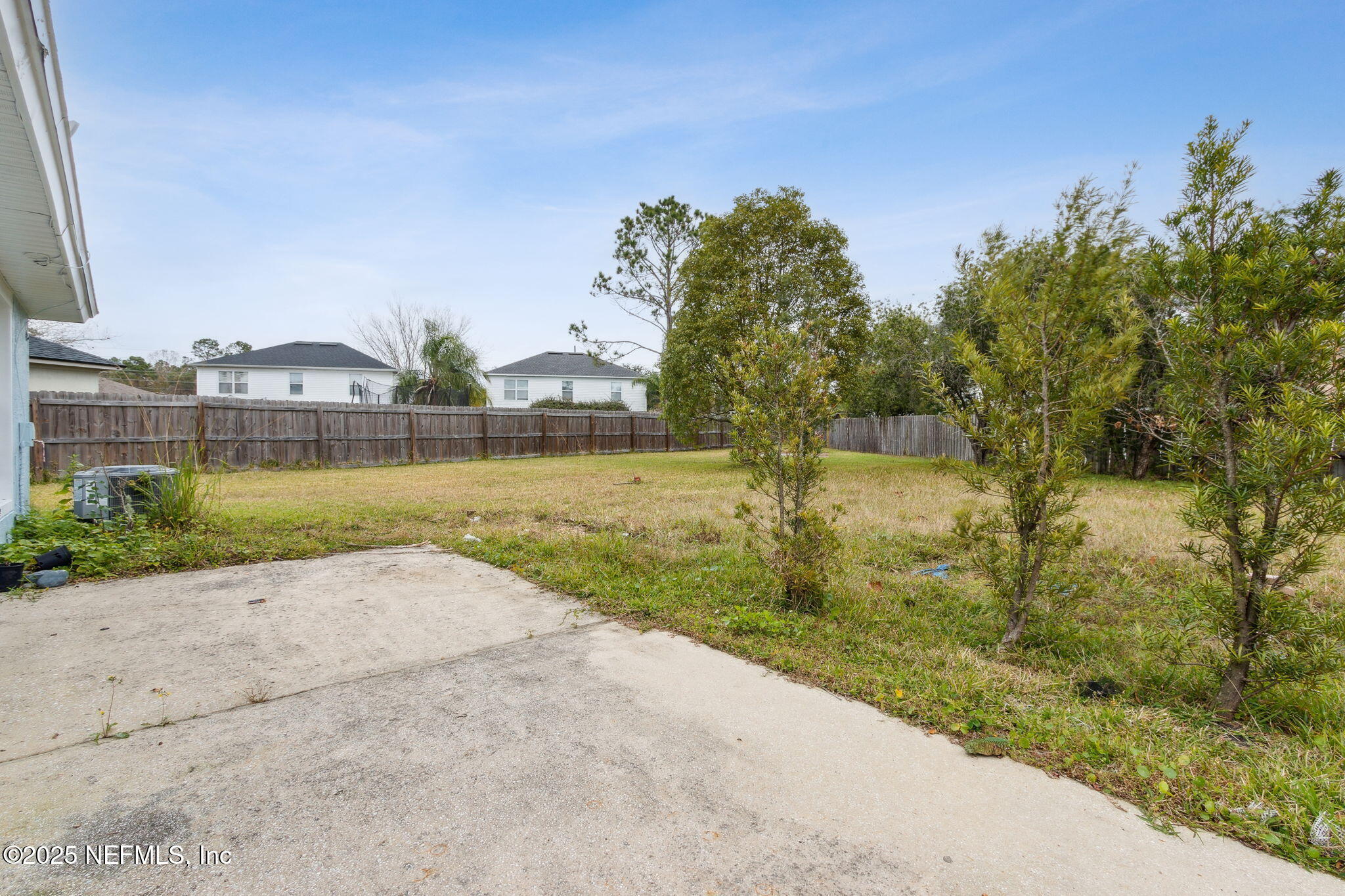 2005 Frogmore Drive Middleburg, FL 32068 - Photo 43 of 43 a view of a lake with houses in the background