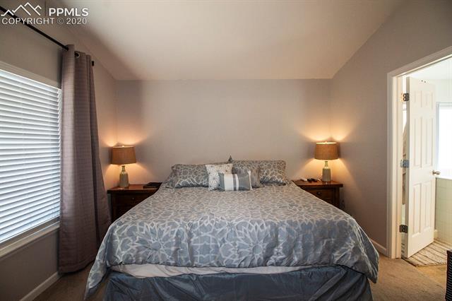 6789 Akron Road Colorado Springs, CO 80923 - Photo 14 of 28 Master bedroom