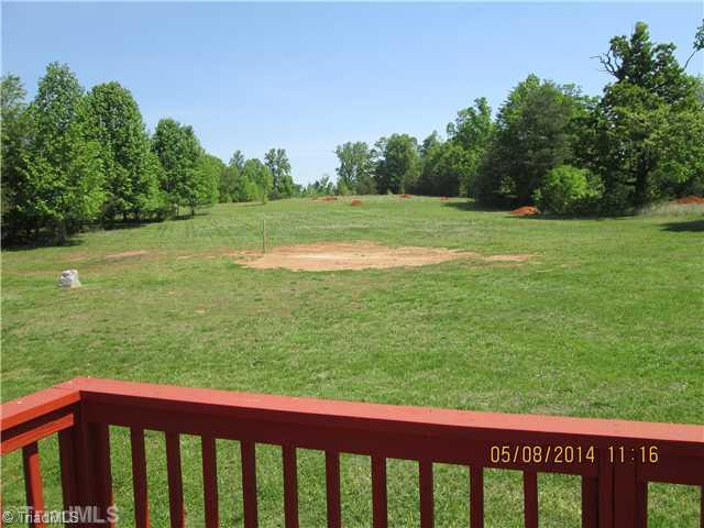 8346 Prince Edward Road Stokesdale, NC 27357 - Photo 15 of 16 Exterior Front. Big back yard!