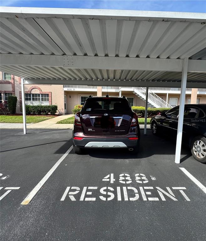 6527 Spring Flower Drive, Unit 21 New Port Richey, FL 34653 - Photo 20 of 21 a view of parking