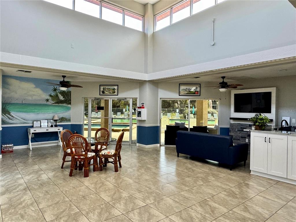 6527 Spring Flower Drive, Unit 21 New Port Richey, FL 34653 - Photo 21 of 21 a view of a dining room with furniture