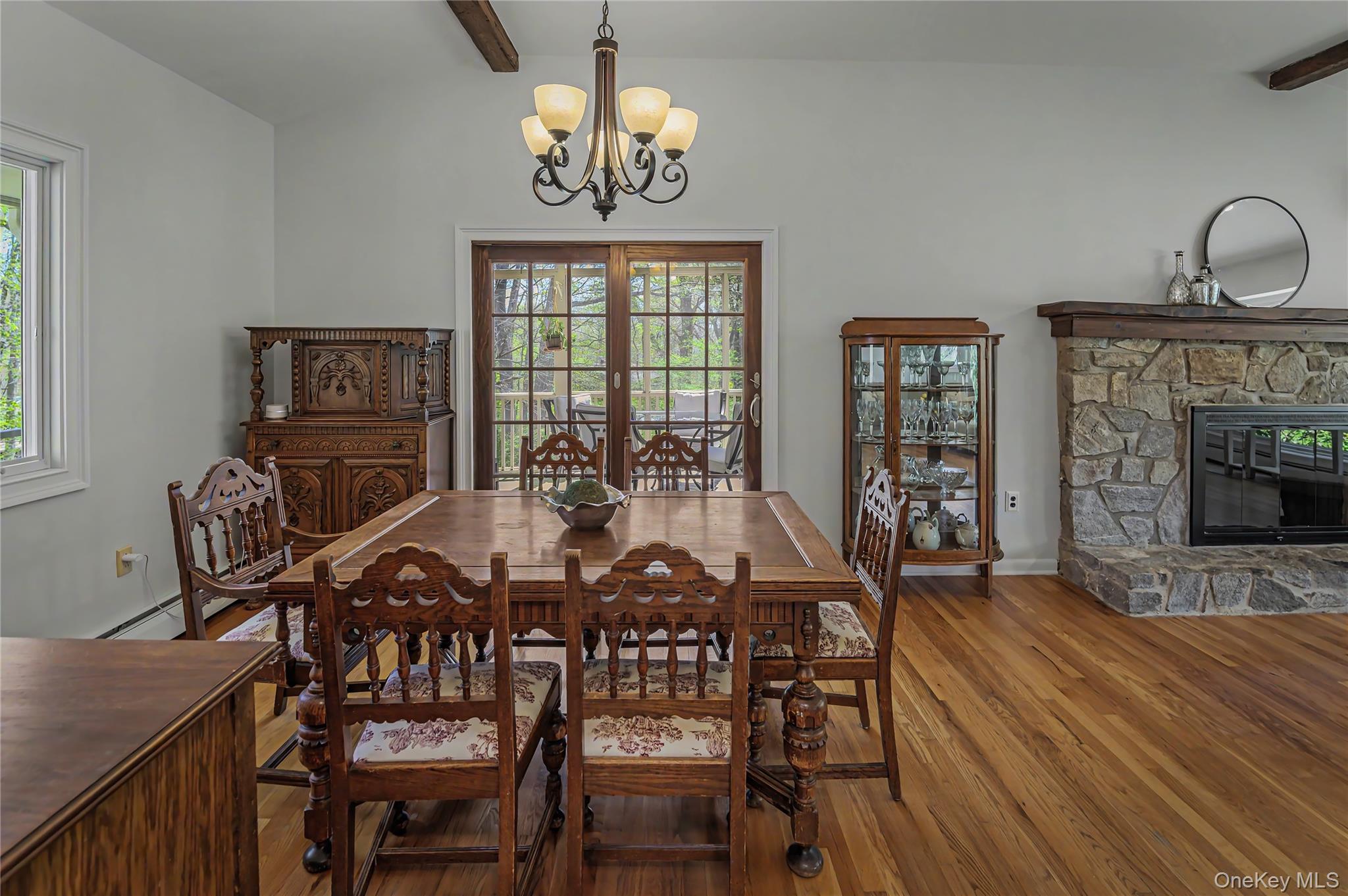 41 Cross Pond Road Pound Ridge, NY 10576 - Photo 15 of 41 a view of a dining room with furniture window and wooden floor