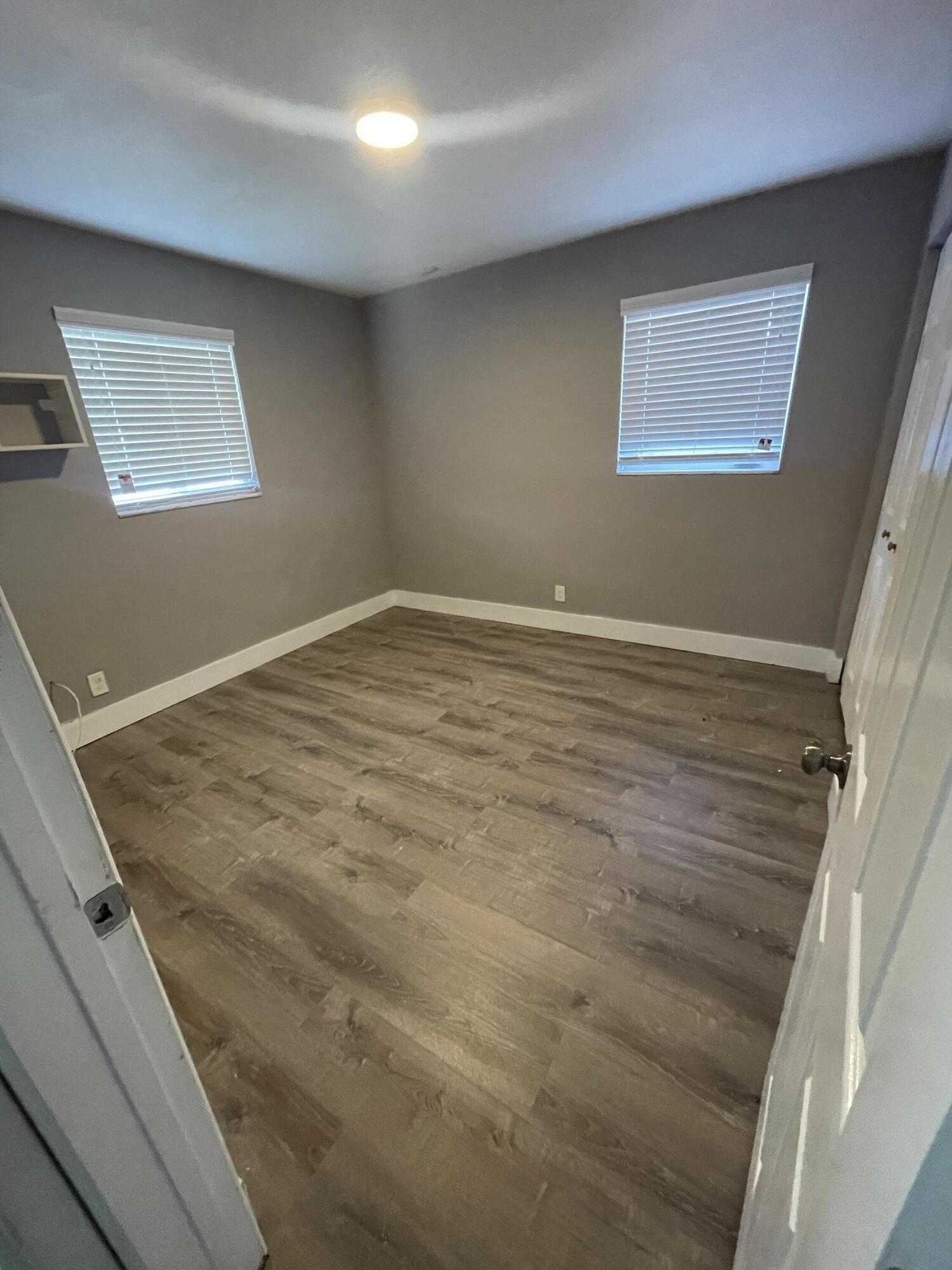 113 Northeast 5th Avenue Boynton Beach, FL 33435 - Photo 10 of 14 a view of an empty room with a window