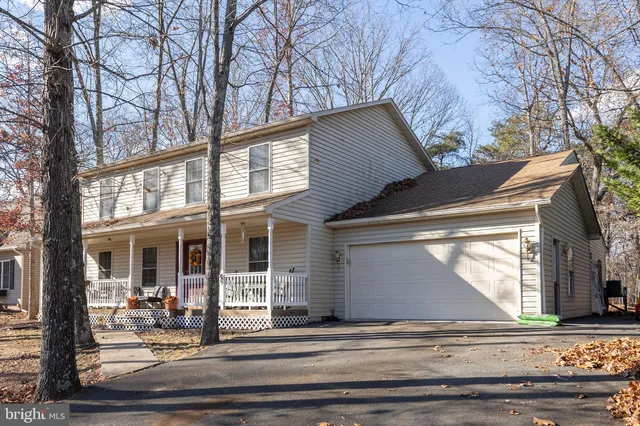 a view of a house with a porch