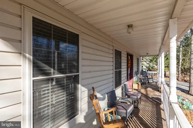 a view of balcony with chairs