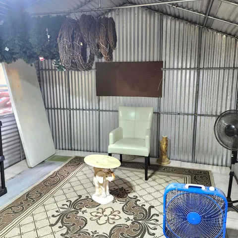 a view of porch with furniture