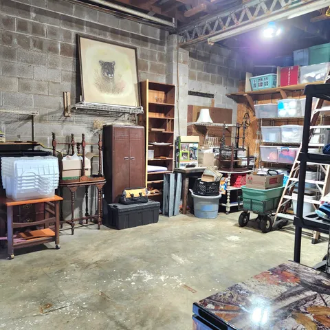 a living room with lots of furniture and a fireplace