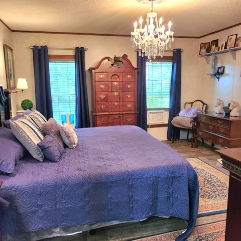 a view of balcony with couch and wooden floor