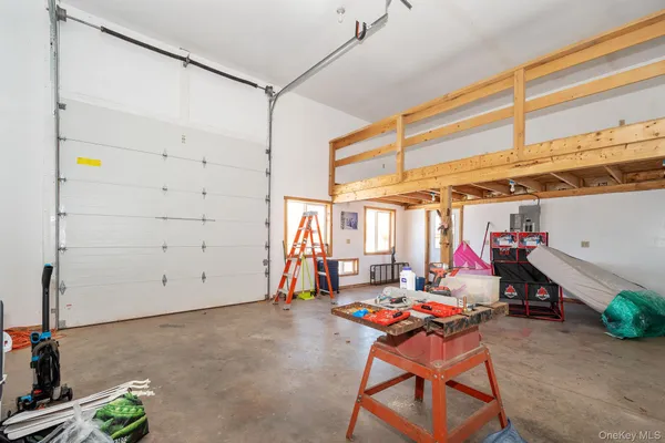 a view of a room with furniture and toys