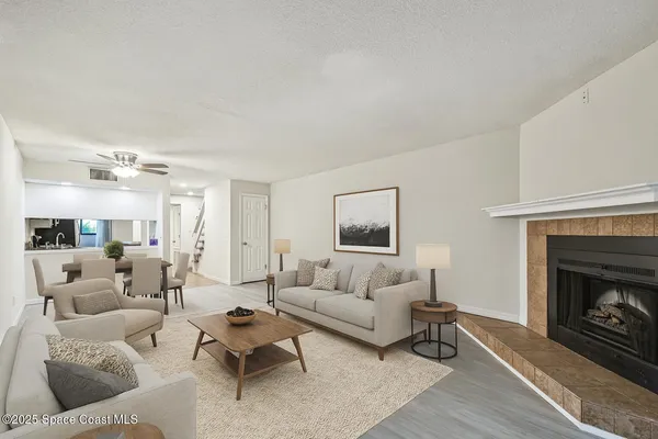 a bedroom with a bed a couch and dresser