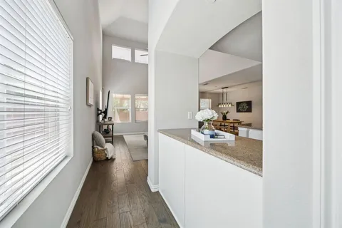 a kitchen with a sink and a refrigerator