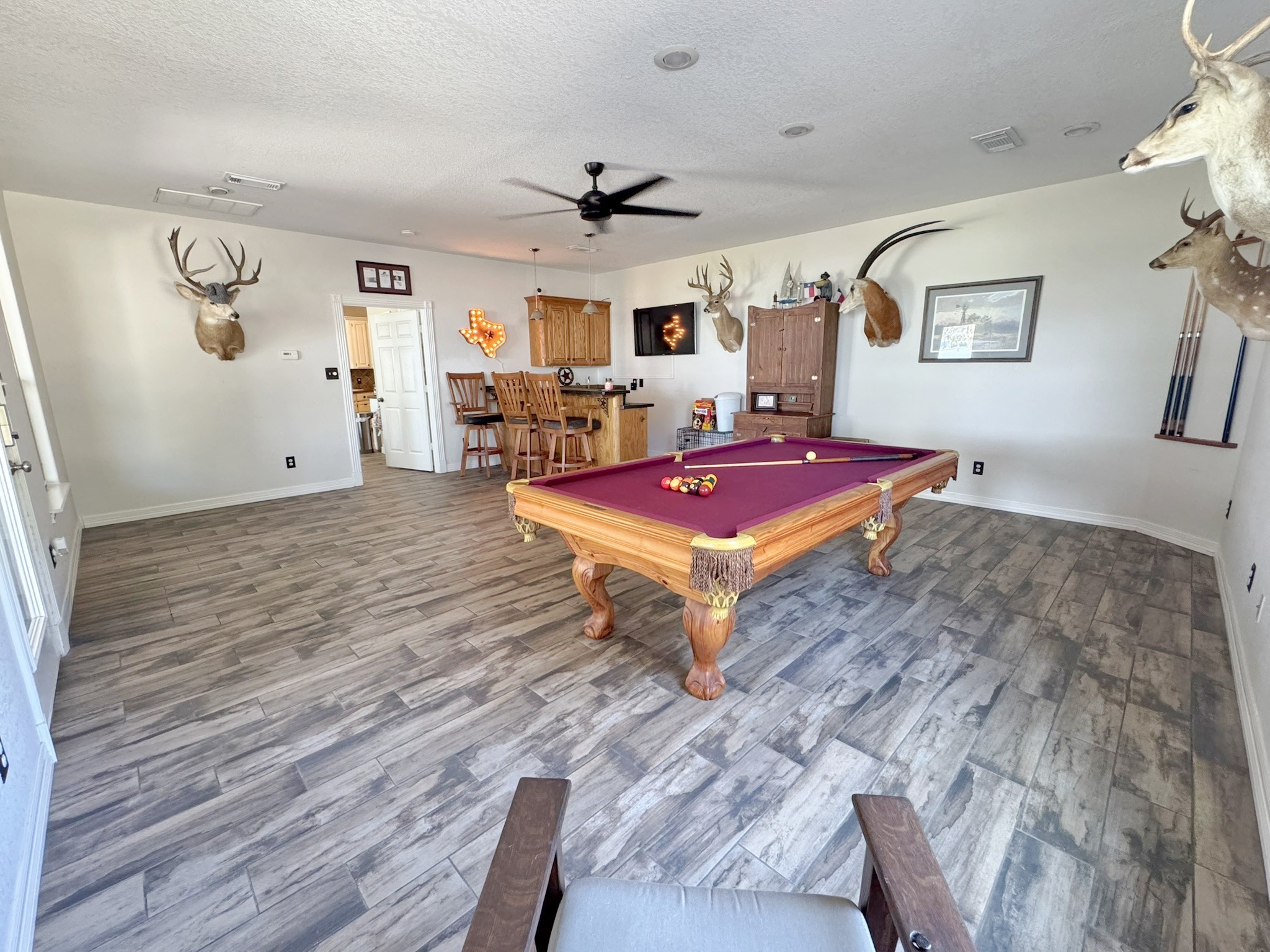 814 Sunset Trail Angleton, TX 77515 - Photo 13 of 26 a spacious bedroom with a bed and a table