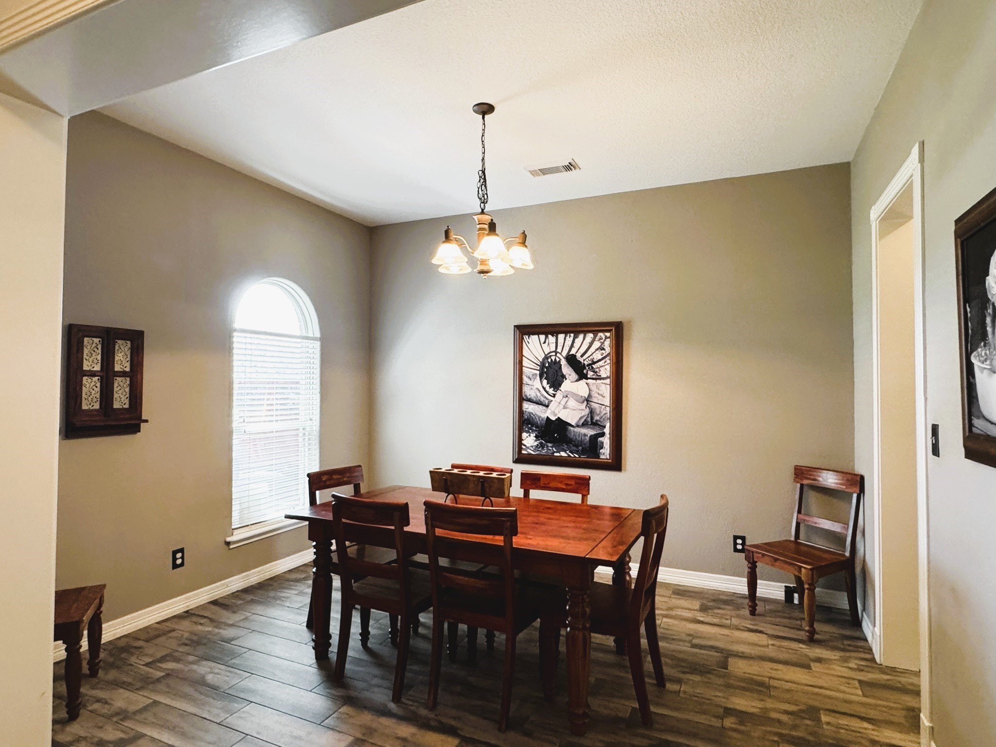 814 Sunset Trail Angleton, TX 77515 - Photo 2 of 26 a view of a dining room with furniture and wooden floor