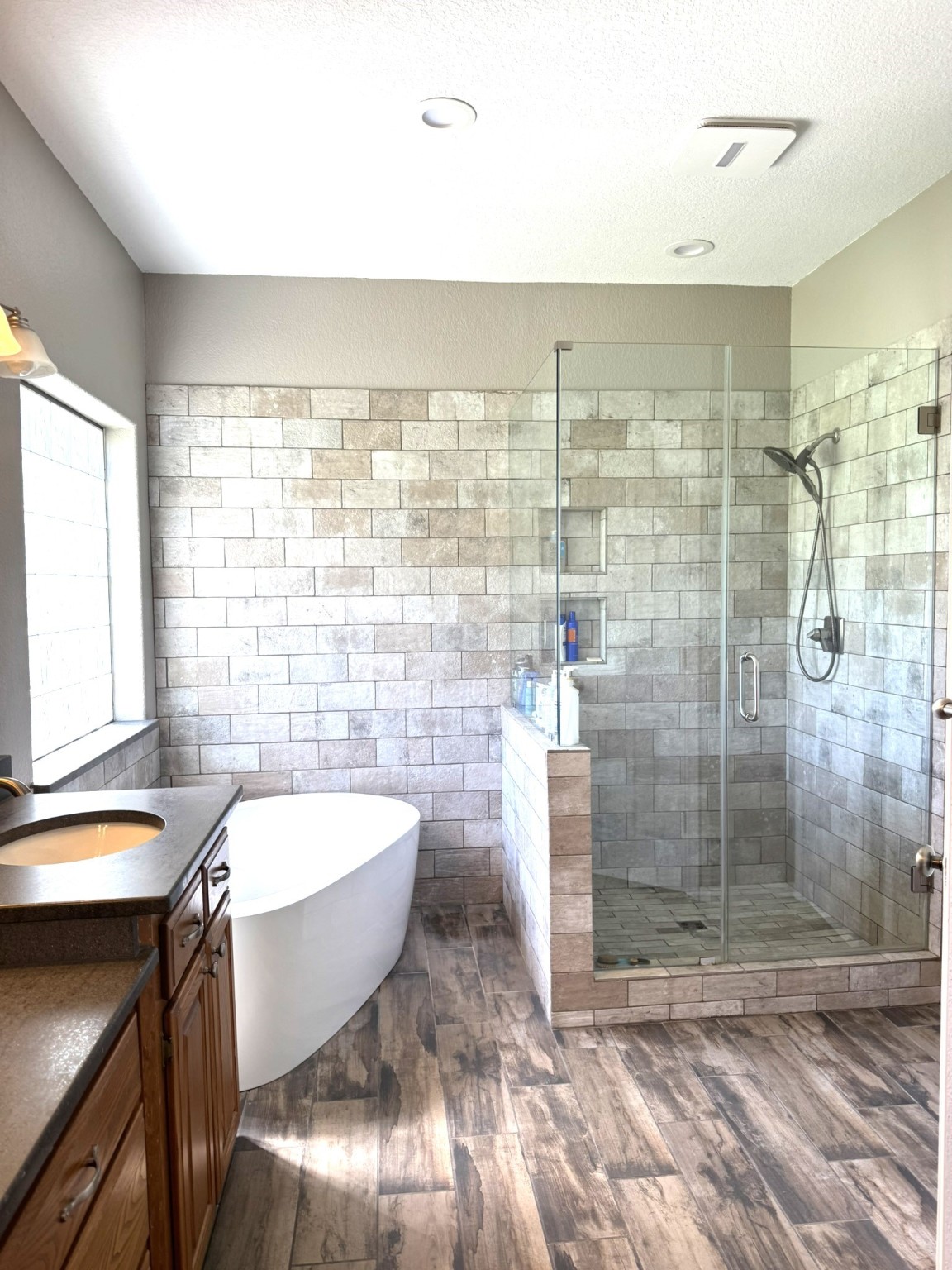 814 Sunset Trail Angleton, TX 77515 - Photo 9 of 26 a bathroom with a bathtub and a shower