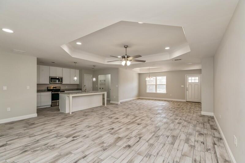 3931 Poverty Creek Road Crestview, FL 32539 - Photo 11 of 34 a view of kitchen with sink and microwave