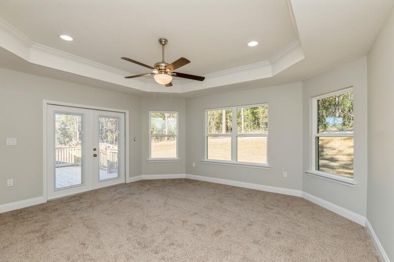 3931 Poverty Creek Road Crestview, FL 32539 - Photo 22 of 34 a view of an empty room with a window