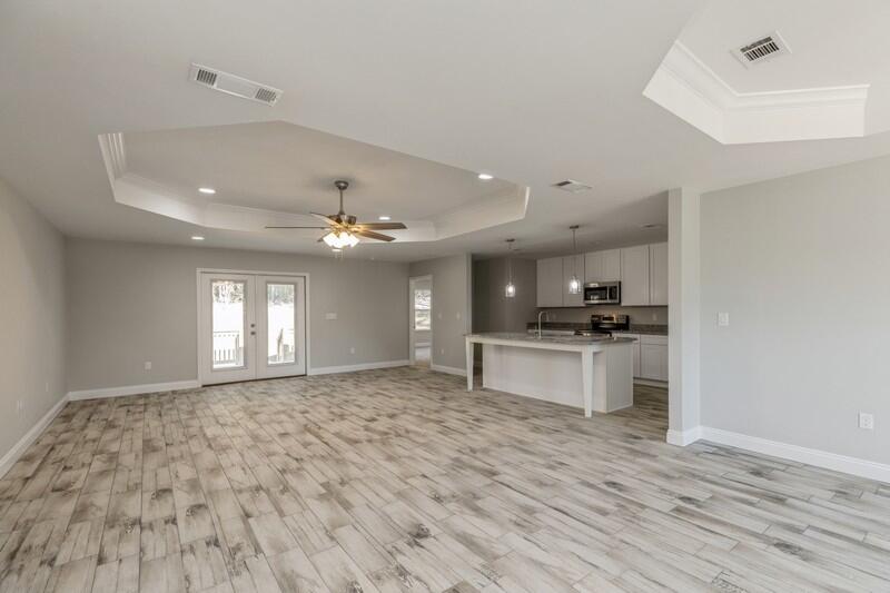 3931 Poverty Creek Road Crestview, FL 32539 - Photo 5 of 34 a view of kitchen with sink and microwave area