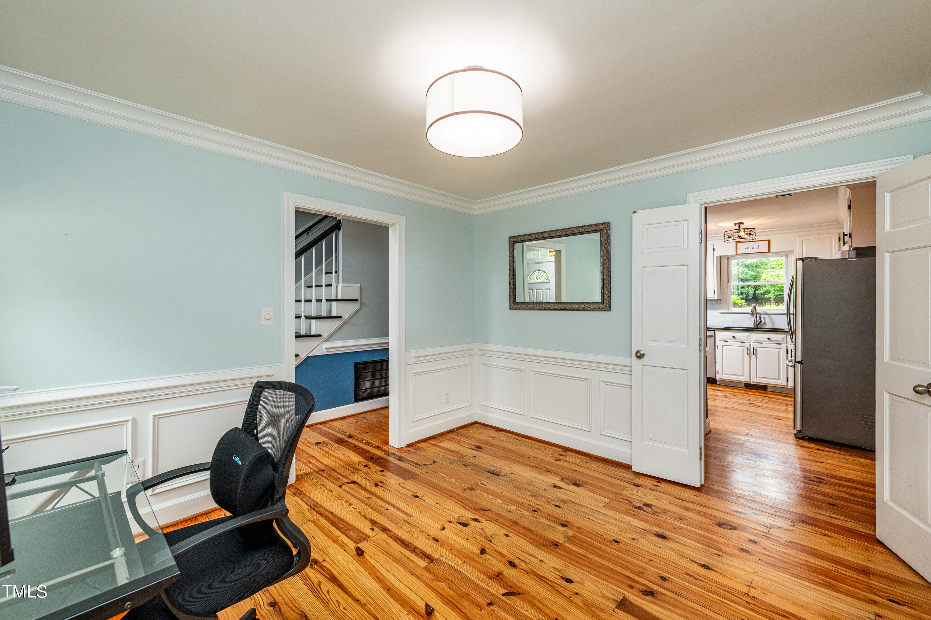 804 Kings Cross Way Raleigh, NC 27615 - Photo 17 of 40 a bedroom with bed and wooden floor