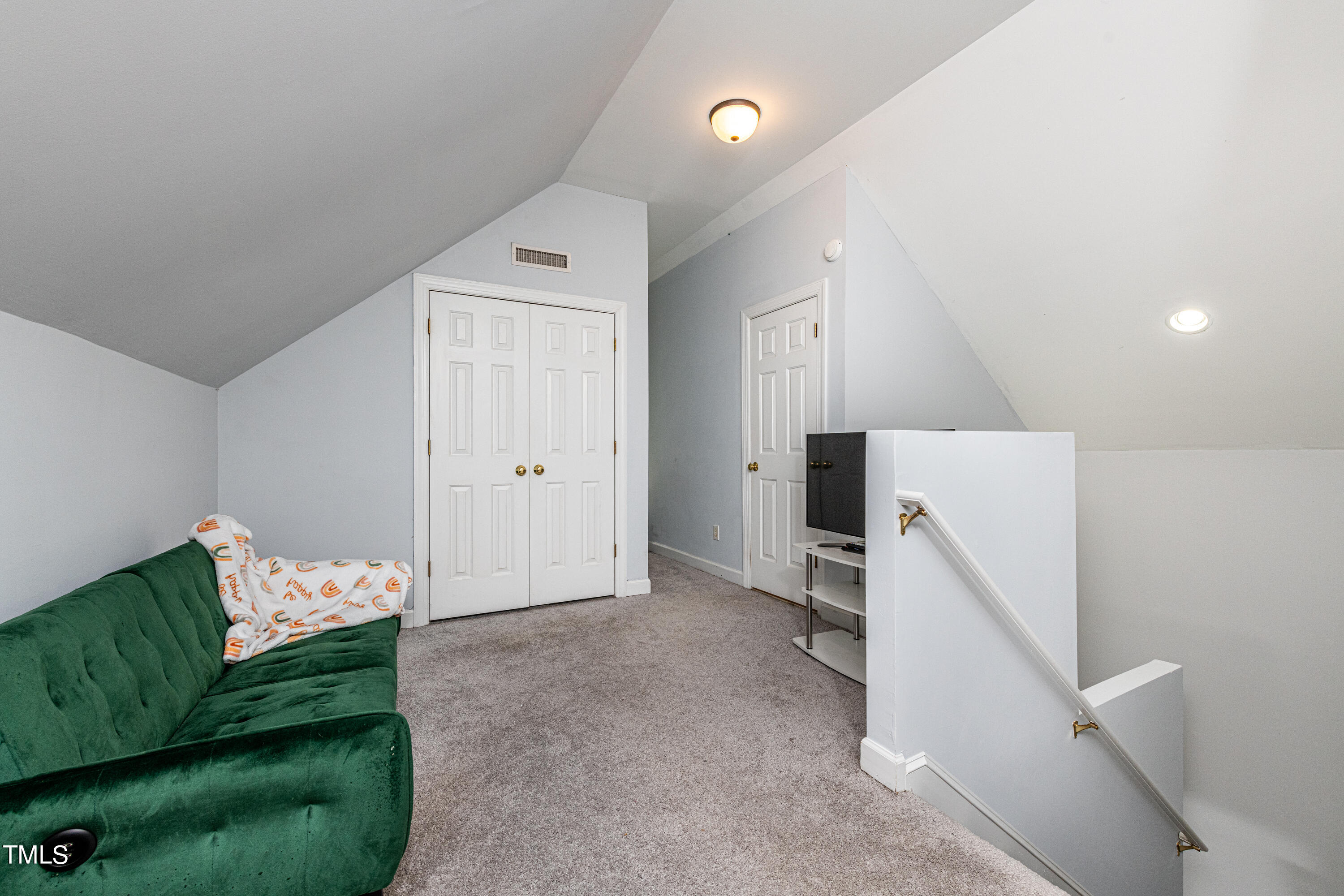 804 Kings Cross Way Raleigh, NC 27615 - Photo 29 of 40 a view of room with hardwood floor and cabinet