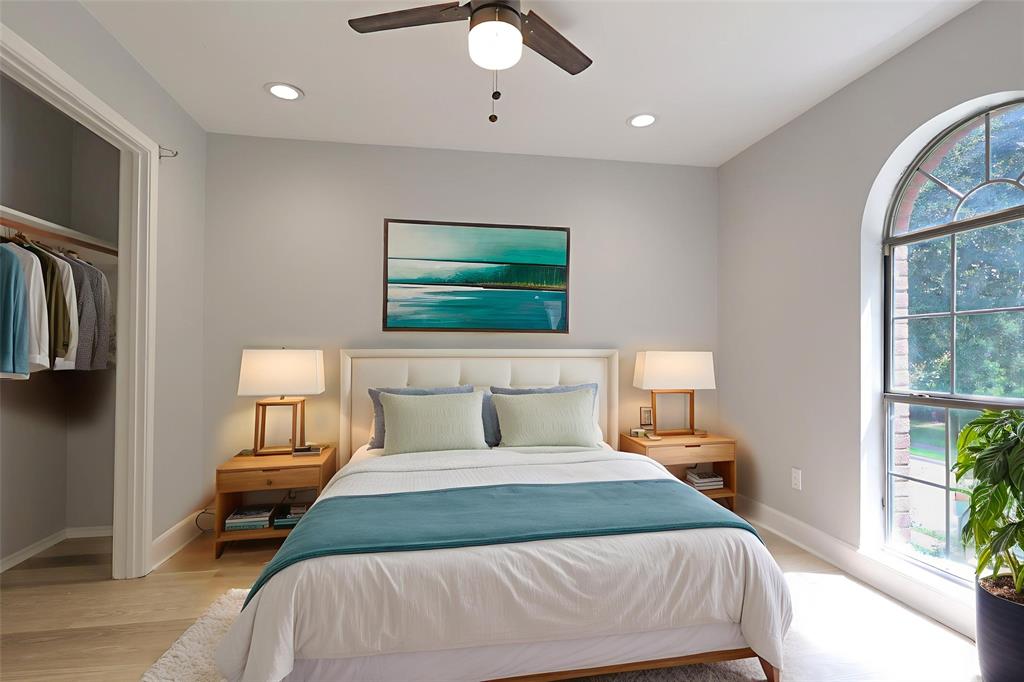 815 Valleycreek Road Mesquite, TX 75181 - Photo 23 of 31 a bedroom with a large bed and a tv