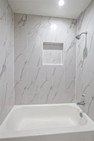 a bathroom with a bathtub
