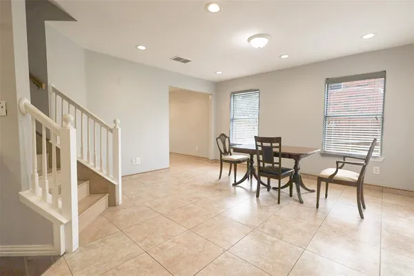 a view of a dining room with furniture