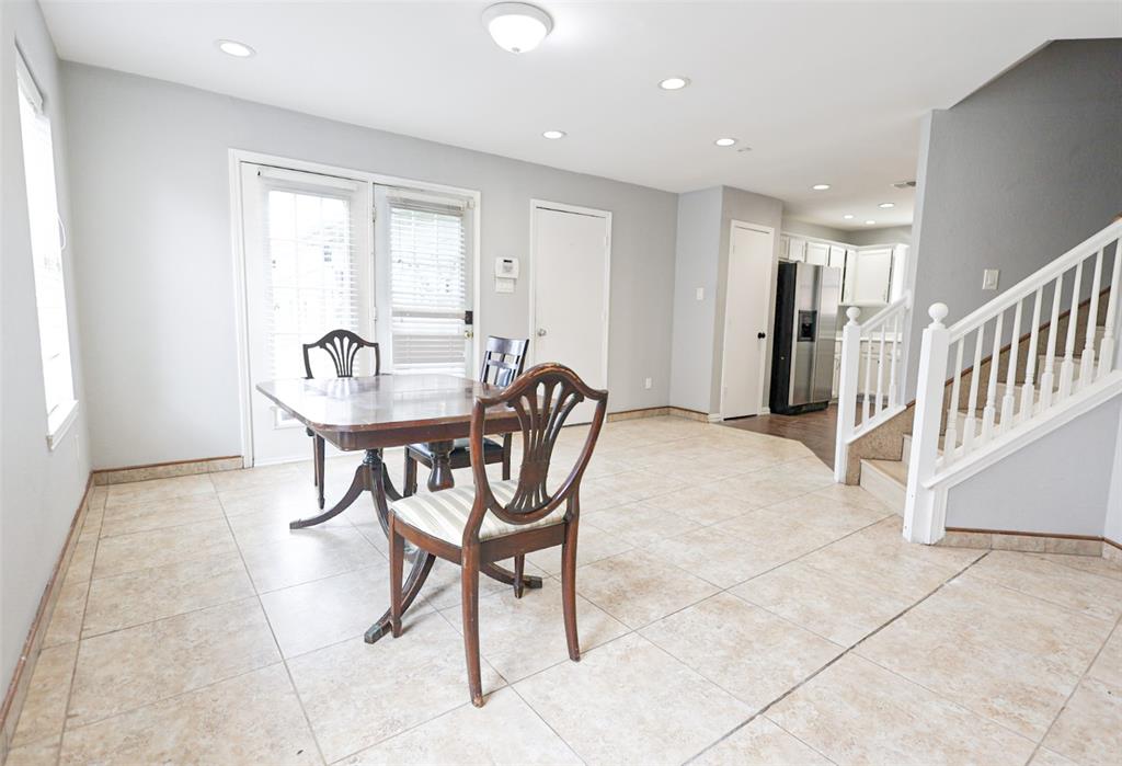 815 Valleycreek Road Mesquite, TX 75181 - Photo 10 of 31 a dining room with furniture and a chandelier