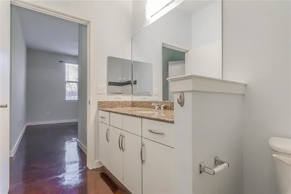 a bathroom with a toilet and a bathtub