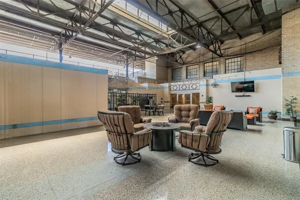 a view of a chairs and table in a patio