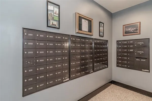 a dining room with furniture and a kitchen view