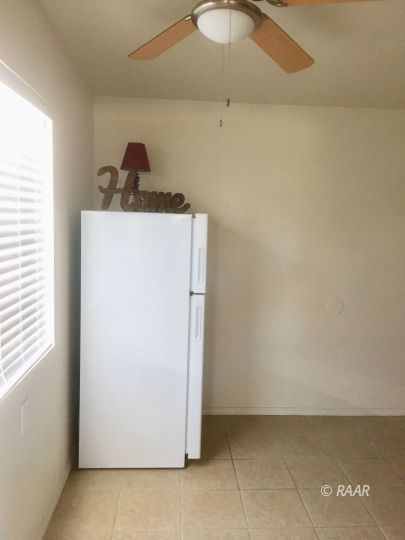1028 Mayo Street Ridgecrest, CA 93555 - Photo 21 of 25 a utility room with a bathtub