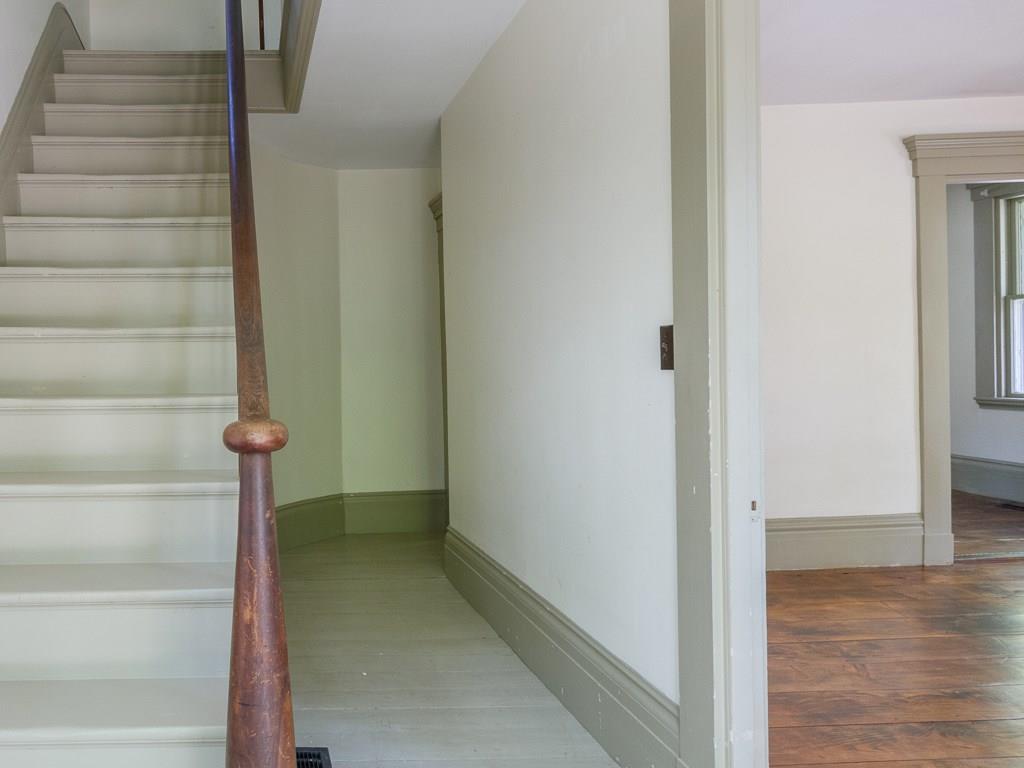 19 Academy Hill Road Newcastle, ME 04553 - Photo 11 of 18 The staircase rises over an unusual...