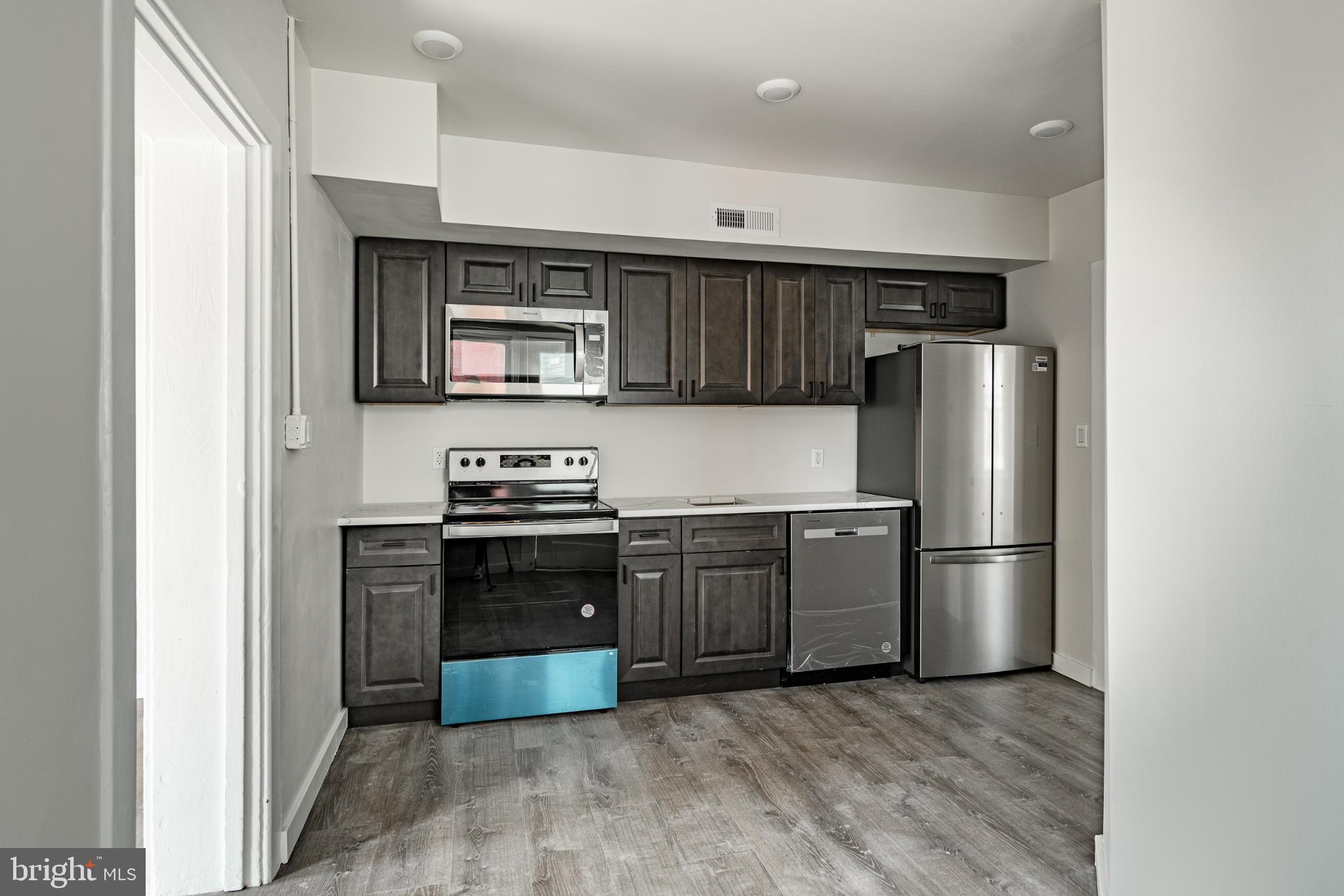 324-326 Darby Road, Unit 1R Havertown, PA 19083 - Photo 1 of 11 Modern kitchen with sleek finishes.