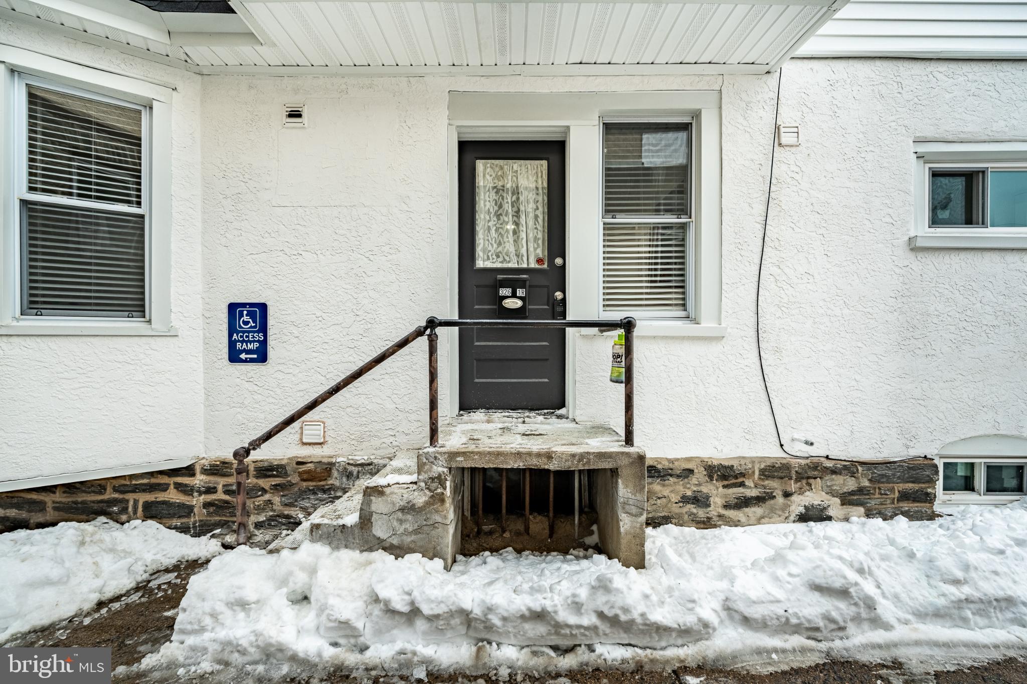324-326 Darby Road, Unit 1R Havertown, PA 19083 - Photo 16 of 17 Accessible entrance with winter charm.