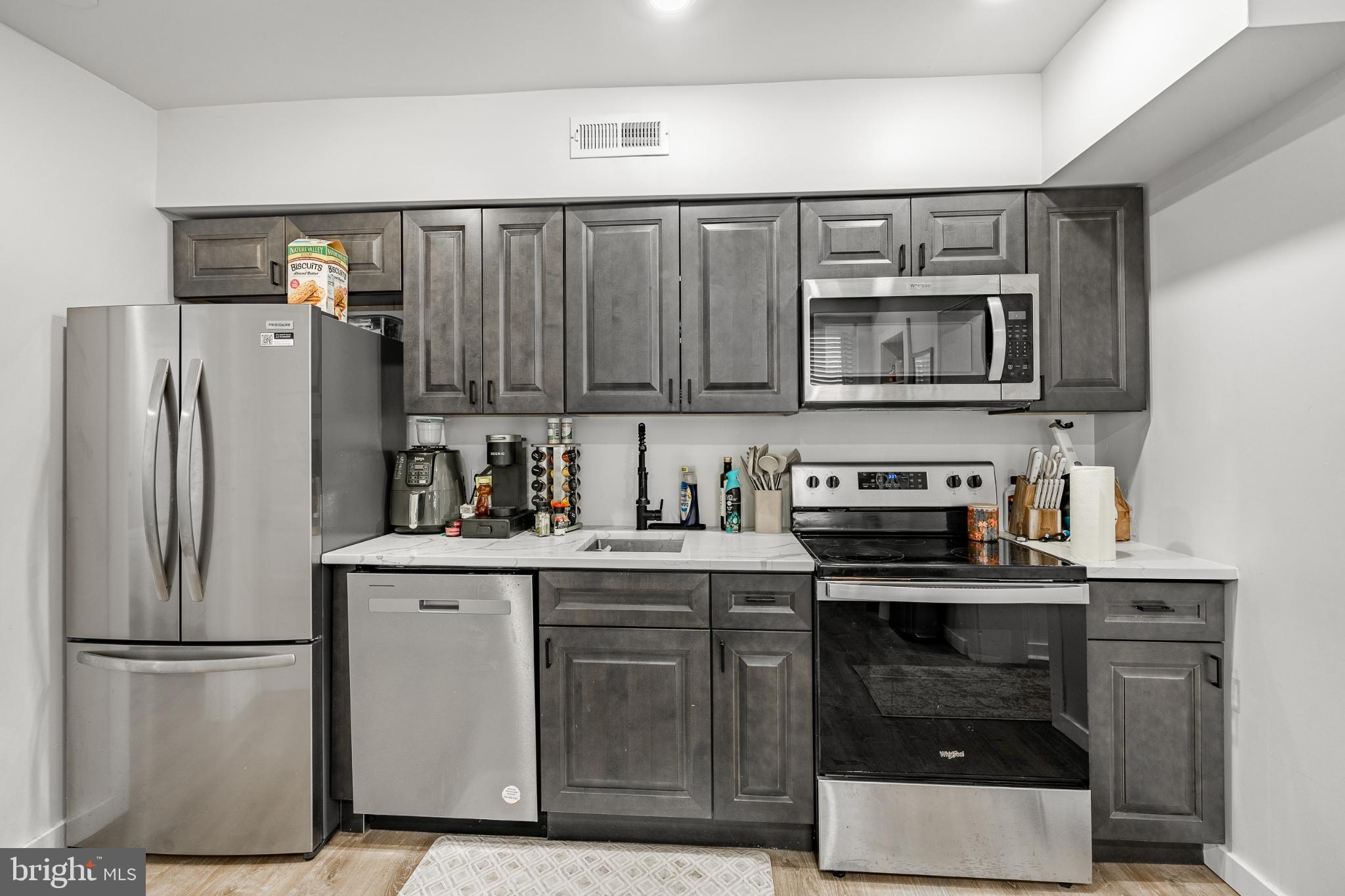324-326 Darby Road, Unit 1R Havertown, PA 19083 - Photo 3 of 17 Modern kitchen with sleek appliances.