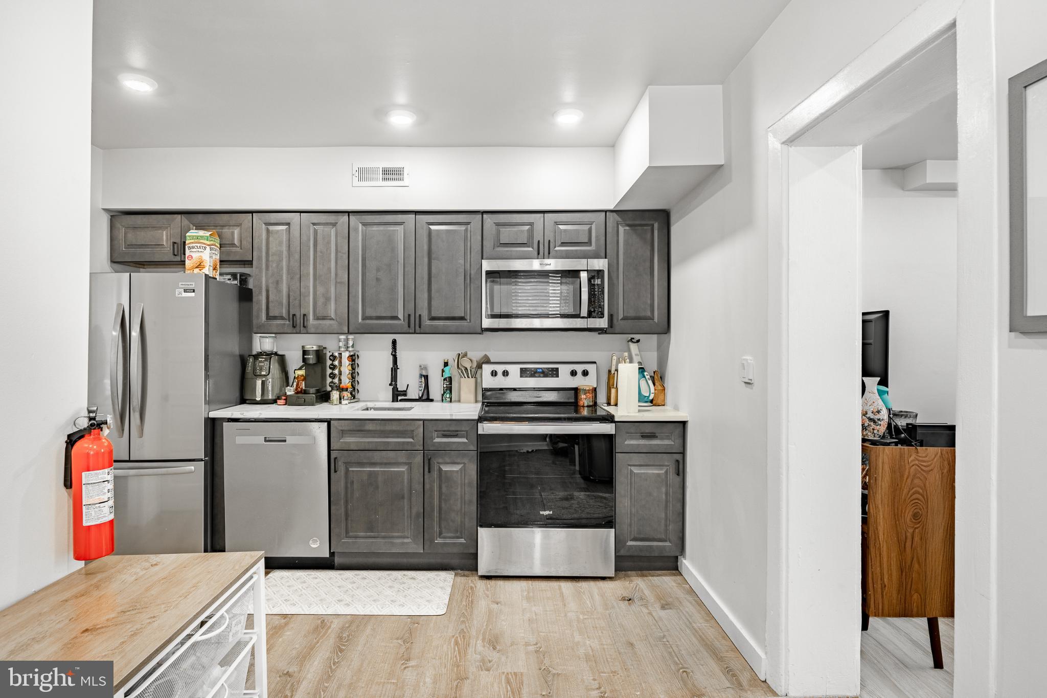 324-326 Darby Road, Unit 1R Havertown, PA 19083 - Photo 5 of 17 Modern kitchen with sleek cabinetry.