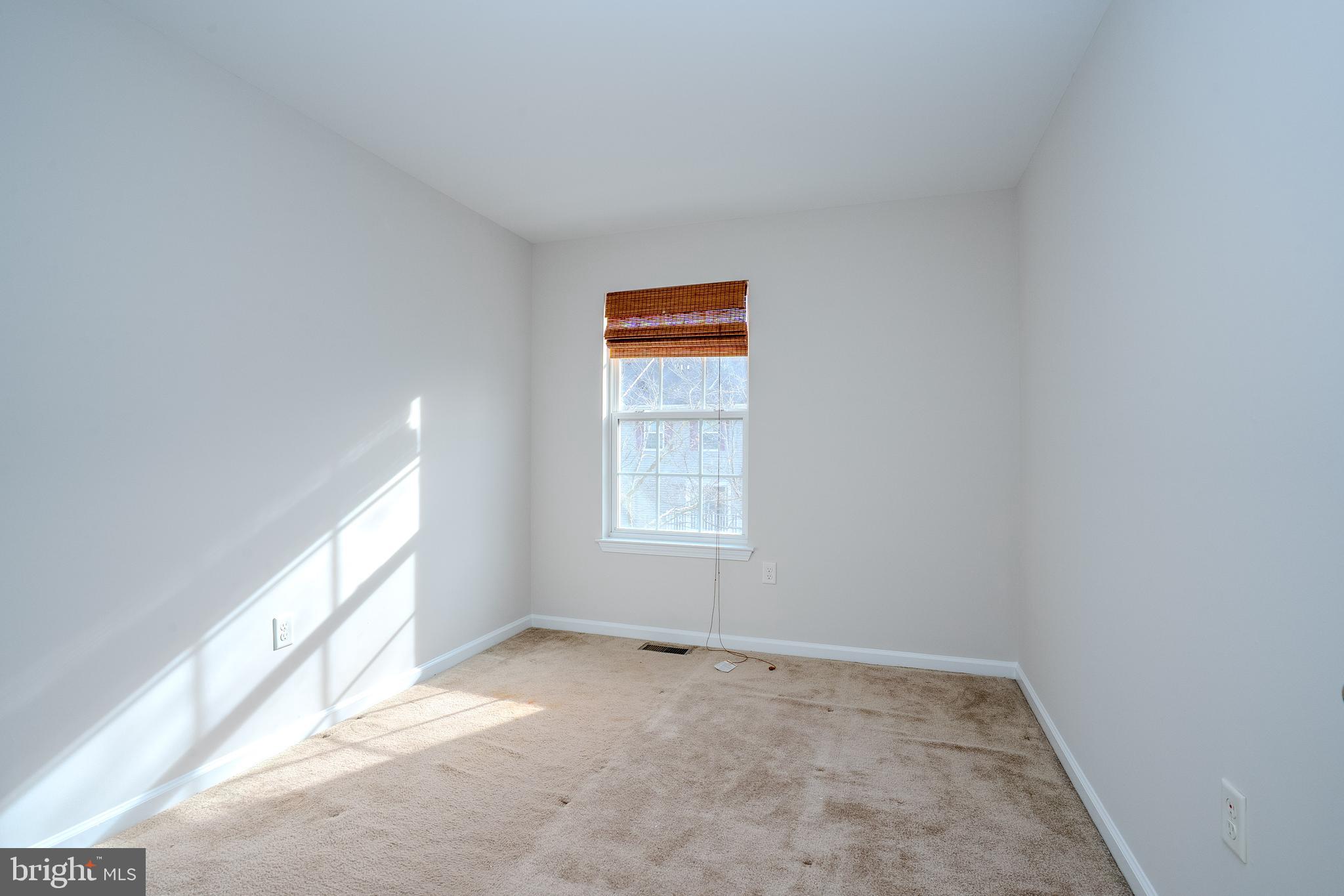 5 Rafting Way Trenton, NJ 08611 - Photo 13 of 26 a view of an empty room and window