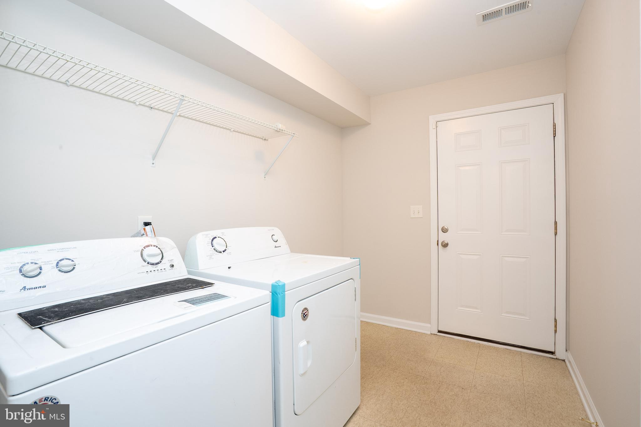 5 Rafting Way Trenton, NJ 08611 - Photo 16 of 26 a view of storage and utility room with washer and dryer