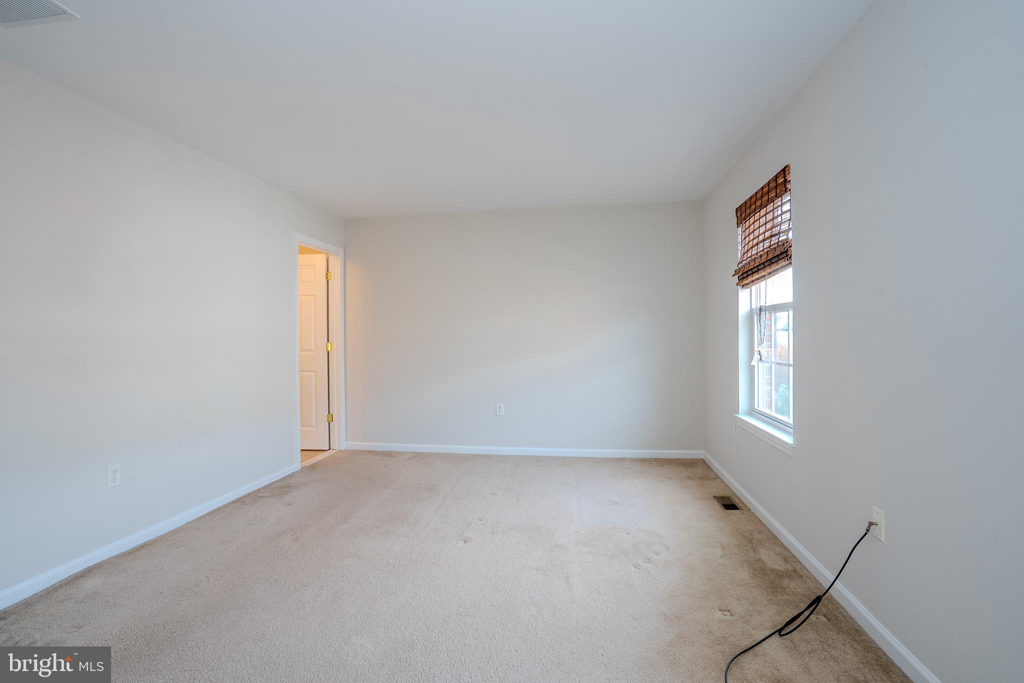 5 Rafting Way Trenton, NJ 08611 - Photo 21 of 26 an empty room with windows and entrance