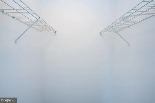 a view of small space with racks on the wall