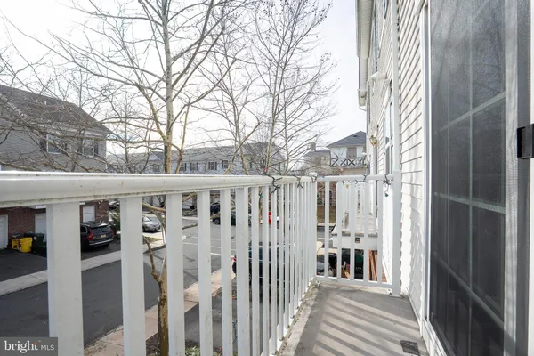 a view of a house with a small yard