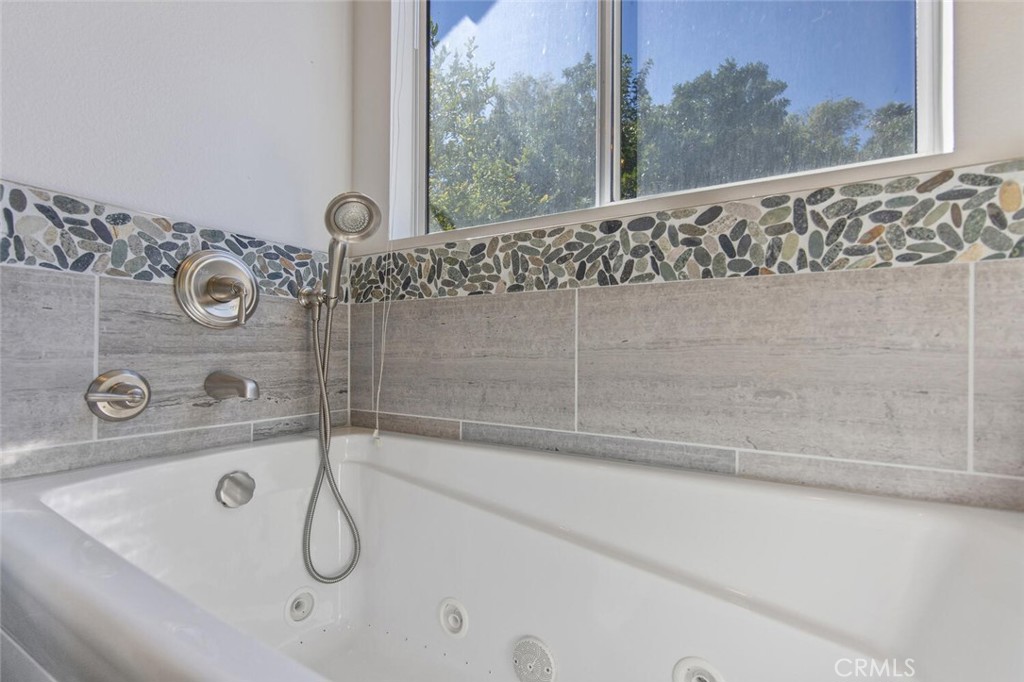 27619-27619 Ron Ridge Drive Saugus, CA 91350 - Photo 22 of 37 a bathroom with a shower