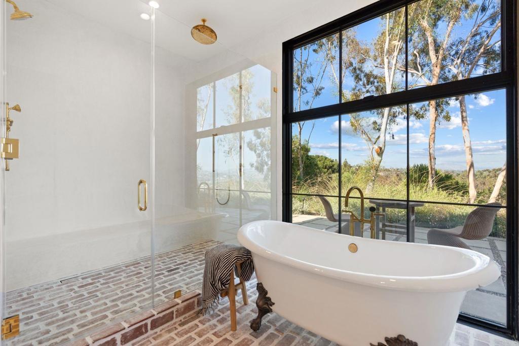 15816 Via Del Alba Rancho Santa Fe, CA 92067 - Photo 28 of 50 a white bath tub sitting next to a window
