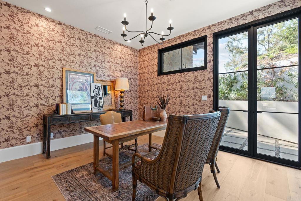 15816 Via Del Alba Rancho Santa Fe, CA 92067 - Photo 31 of 50 a view of a dining room with furniture window and wooden floor