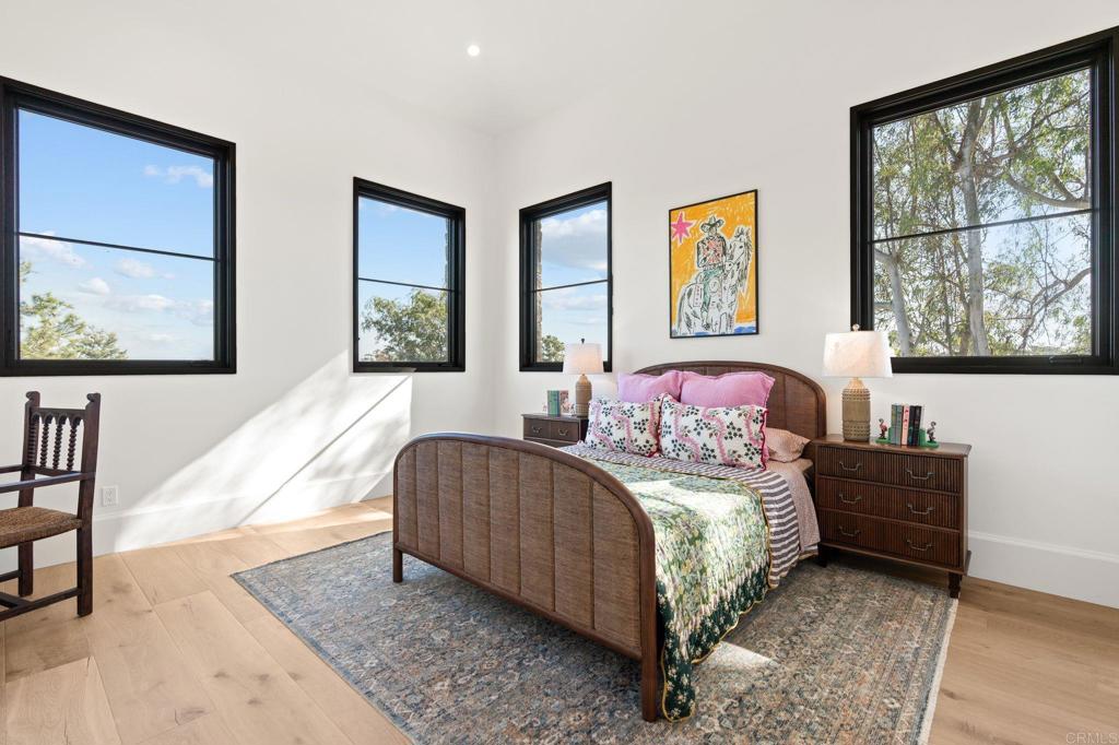 15816 Via Del Alba Rancho Santa Fe, CA 92067 - Photo 35 of 50 a bedroom with two beds and a large window