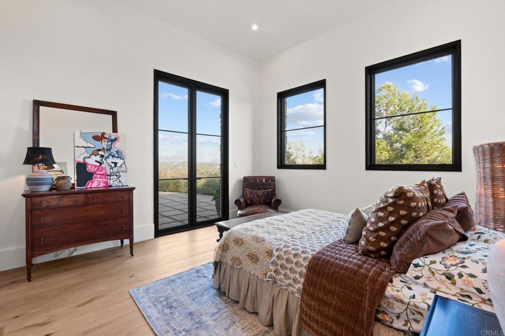 15816 Via Del Alba Rancho Santa Fe, CA 92067 - Photo 37 of 50 a bedroom with a bed and a window