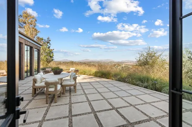 a view of couch in wooden floor