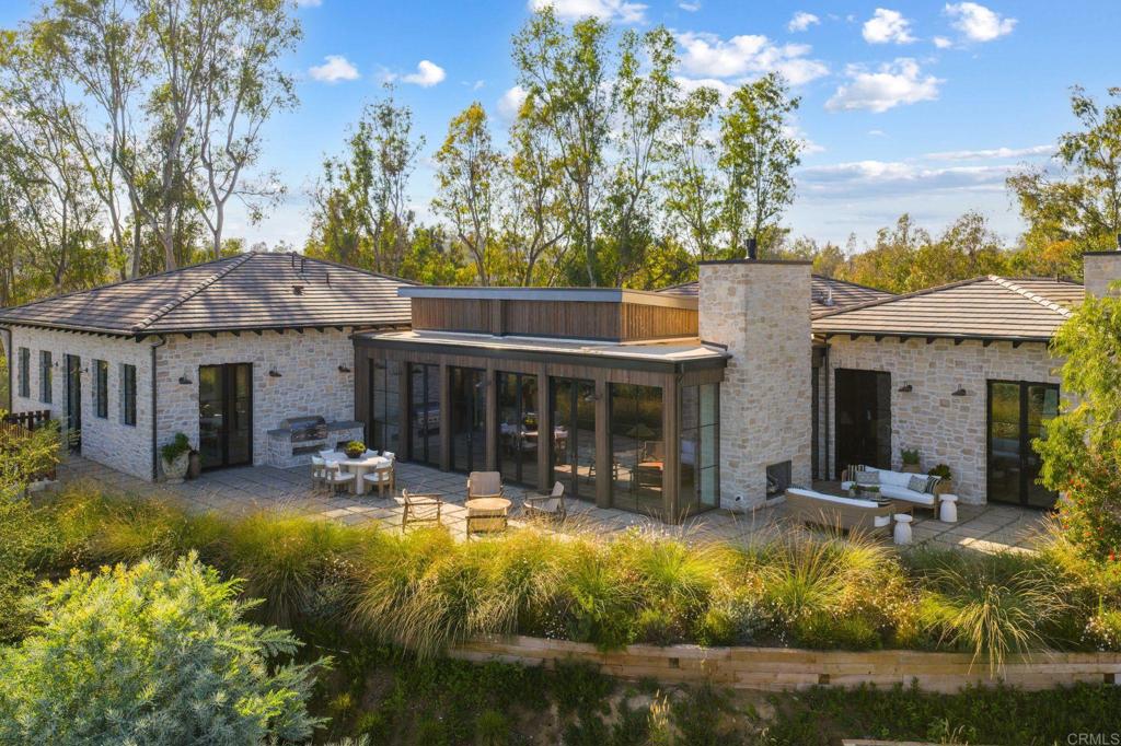 15816 Via Del Alba Rancho Santa Fe, CA 92067 - Photo 43 of 50 a view of a house with swimming pool and sitting area