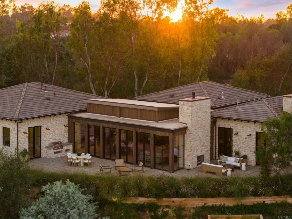 15816 Via Del Alba Rancho Santa Fe, CA 92067 - Photo 47 of 50 a view of a house with garden and porch